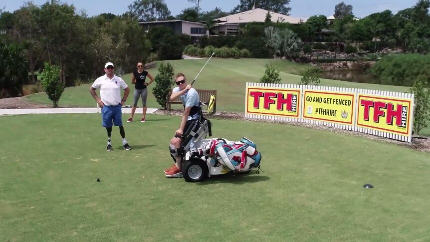 A man in a special wheelchair playing golf