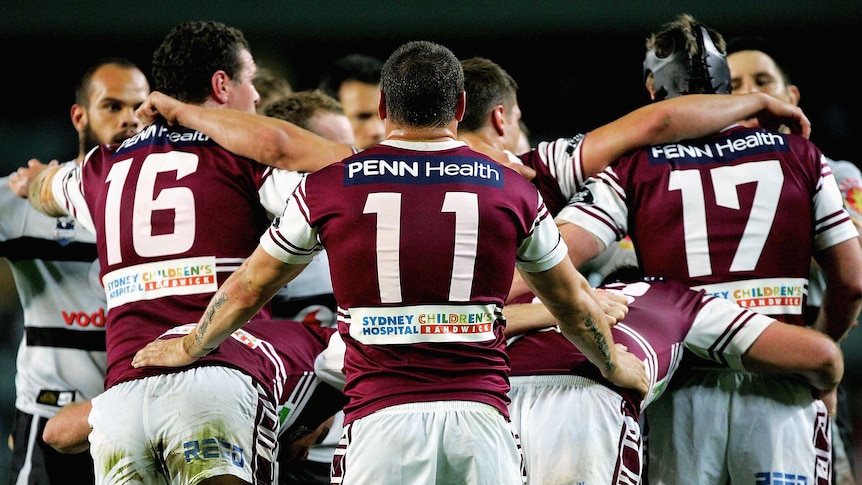 Manly players line up for a scrum.