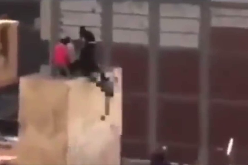 Still from a video retweeted by Donald Trump showing Muslim Brotherhood supporters throwing an opponent off a rooftop.