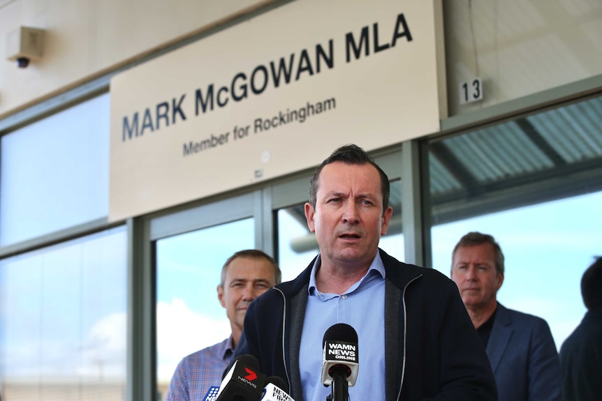 WA Premier Mark McGowan speaks in front of his Rockingham electorate office with Roger Cook.