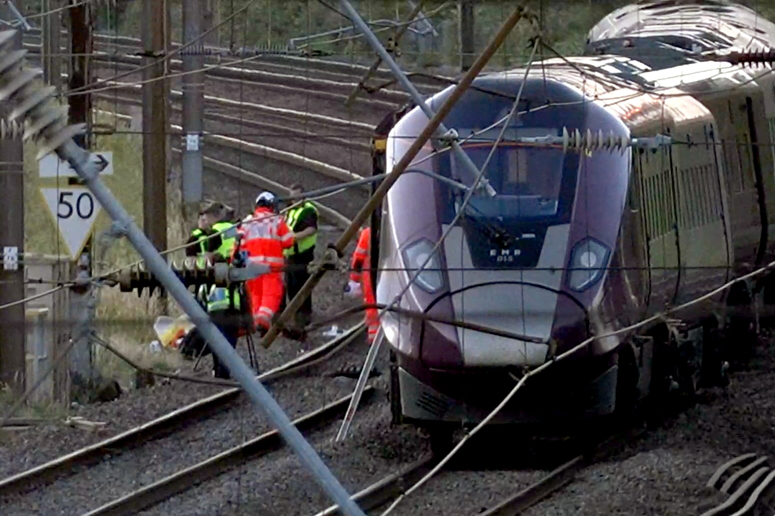 UK police investigate train crash that killed a driver and injured 80