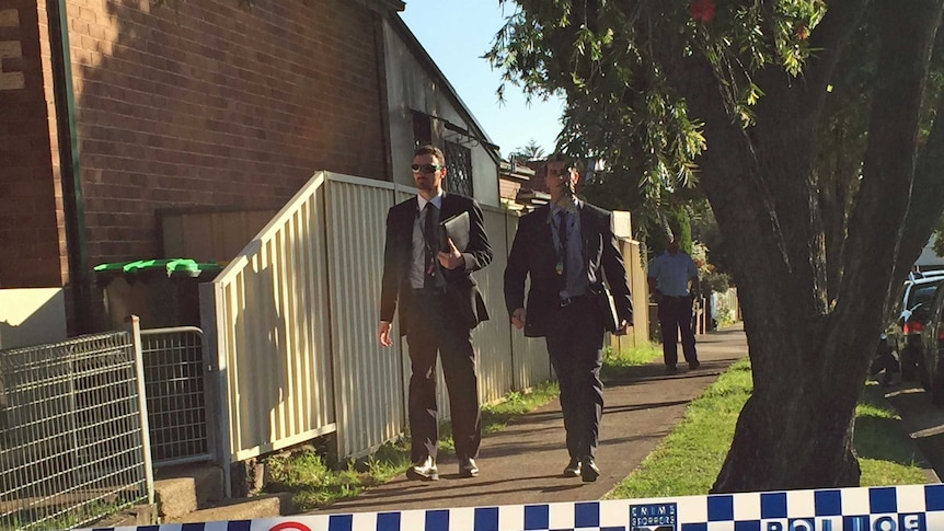 Police in Campsie where two bodies have been found