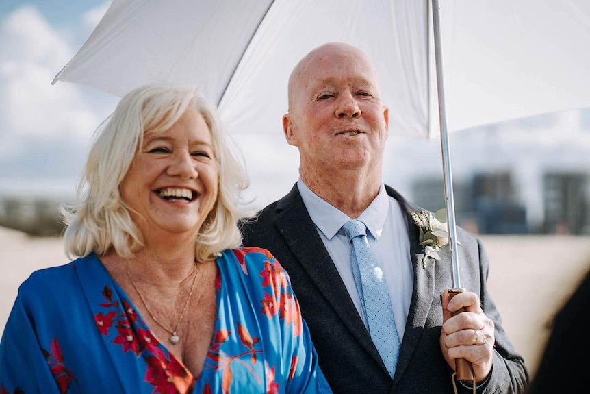 Brett Gibbs and wife Genevieve renewing their vows