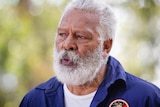 A head and shoulders shot of Ernie Dingo speaking during a media conference.