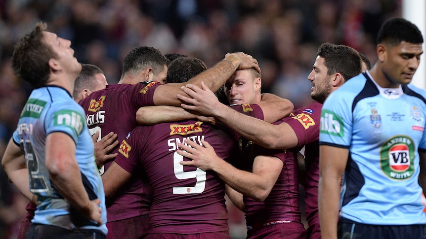 Queensland celebrates a try
