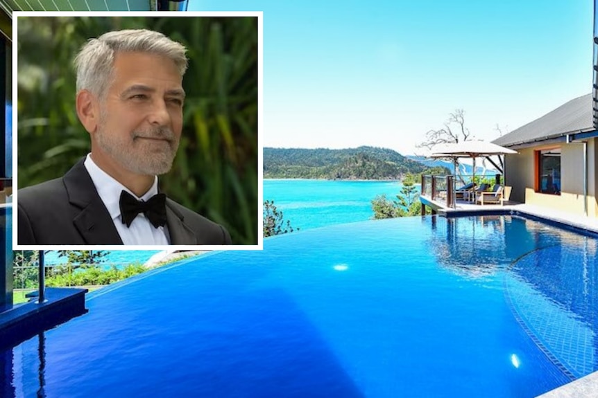 A cut out of George Clooney in front of an infinity pool