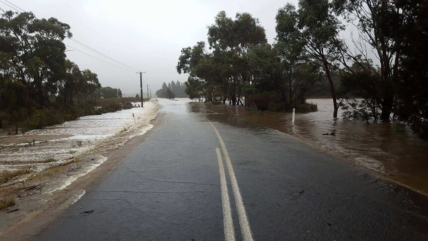 A road is completely flooded on Tasmania's east coast. June 6, 2016.