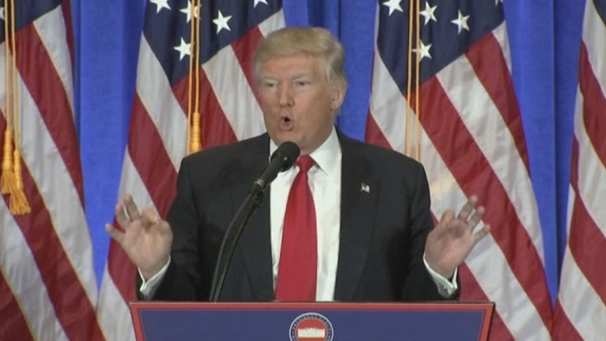 Trump speaks at podium