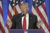 Trump speaks at podium