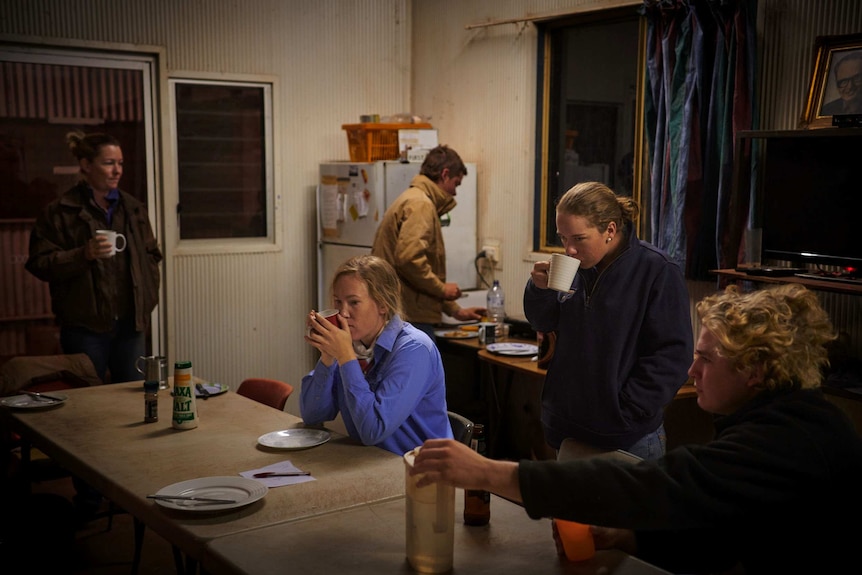 Stephanie Coombes is with other station workers eating breakfast and coffee before sunrise