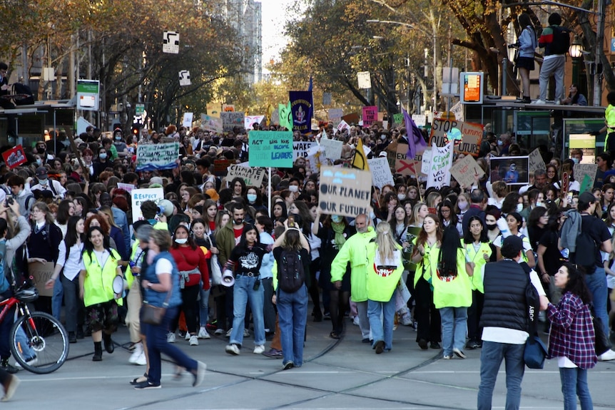 A large crowd of thousands of protesters march through Melbourne's CBD.