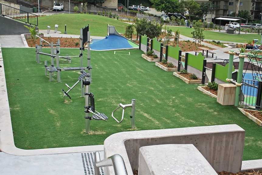 A fitness station on artificial turf. 