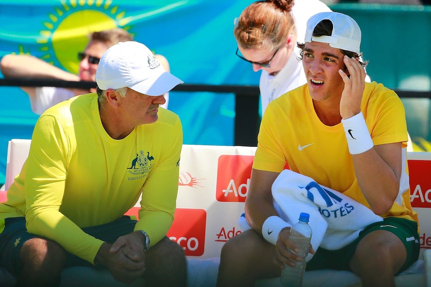 Thanasi Kokkinakis consoled by Wally Masur