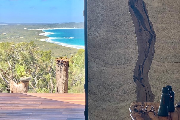 Looking through the kitchen from a house made of hemp toward the ocean in southern WA