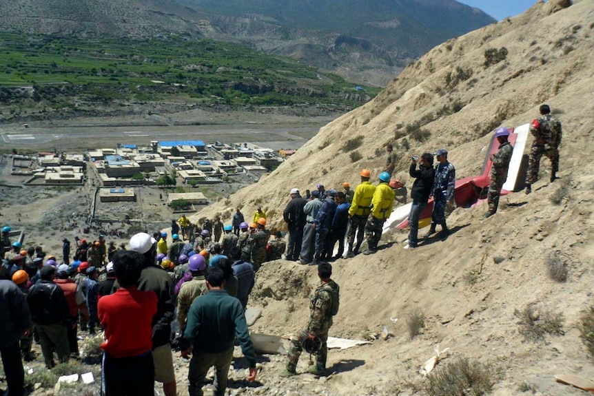 Rescue workers at plane crash site at Jomsom, Nepal.