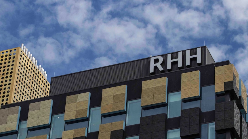 A building with the letters RHH at the top