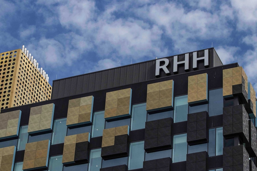 A building with the letters RHH at the top