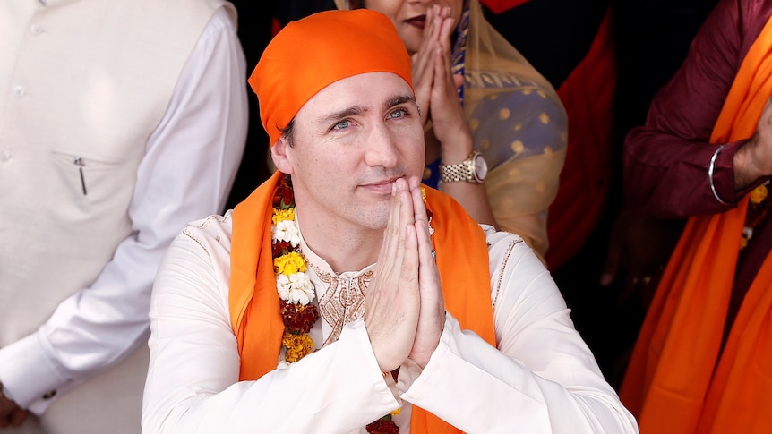 Canadian Prime Minister Justin Trudeau greets people during visit to holy Sikh shrine of Golden temple in Amristar, India.