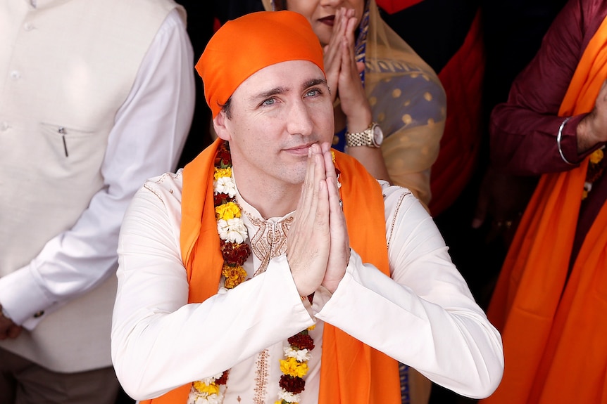 Canadian Prime Minister Justin Trudeau greets people during visit to holy Sikh shrine of Golden temple in Amristar, India.