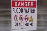 A sign saying DANGER FLOOD WATER DO NOT ENTER