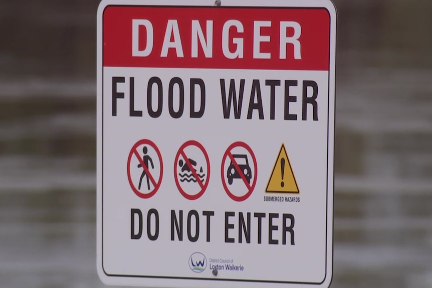 A sign saying DANGER FLOOD WATER DO NOT ENTER