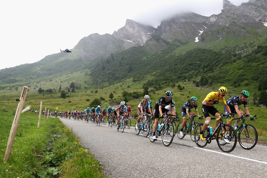 Chris Froome rides in the peloton in 20th stage of Tour de France