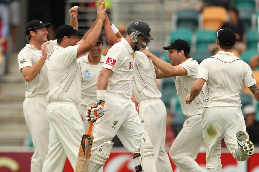 Black Caps celebrate Hussey's wicket