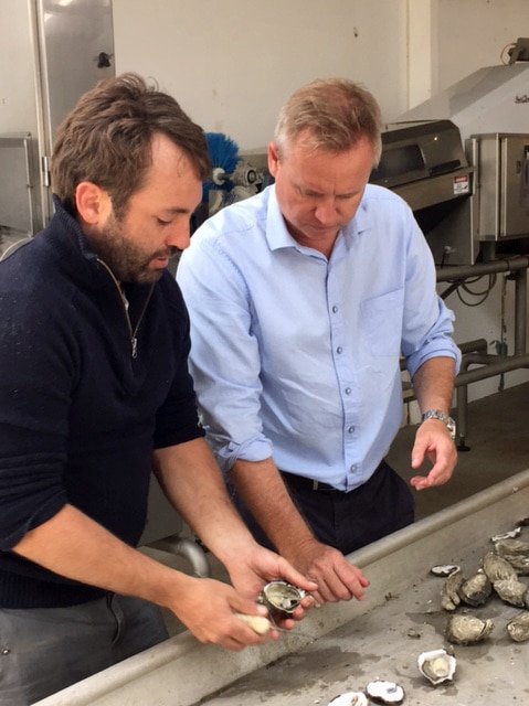Oyster grower Josh Poke with Jeremy Rockliff
