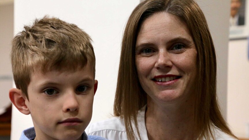 Headshots of a boy with his mother.