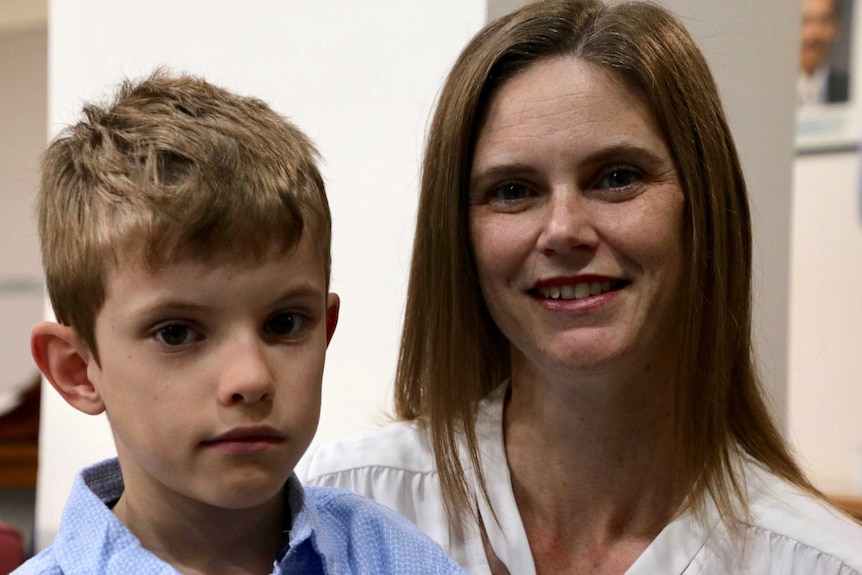 Headshots of a boy with his mother.