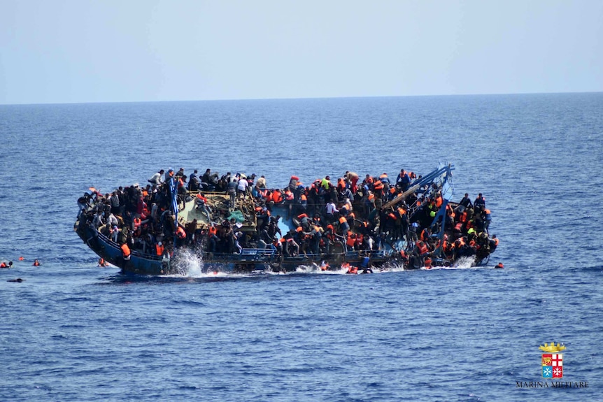 A picture of a boat capsizing in the Mediterranean last month.