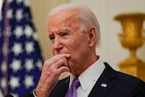 President Joe Biden pauses as he speaks about the coronavirus