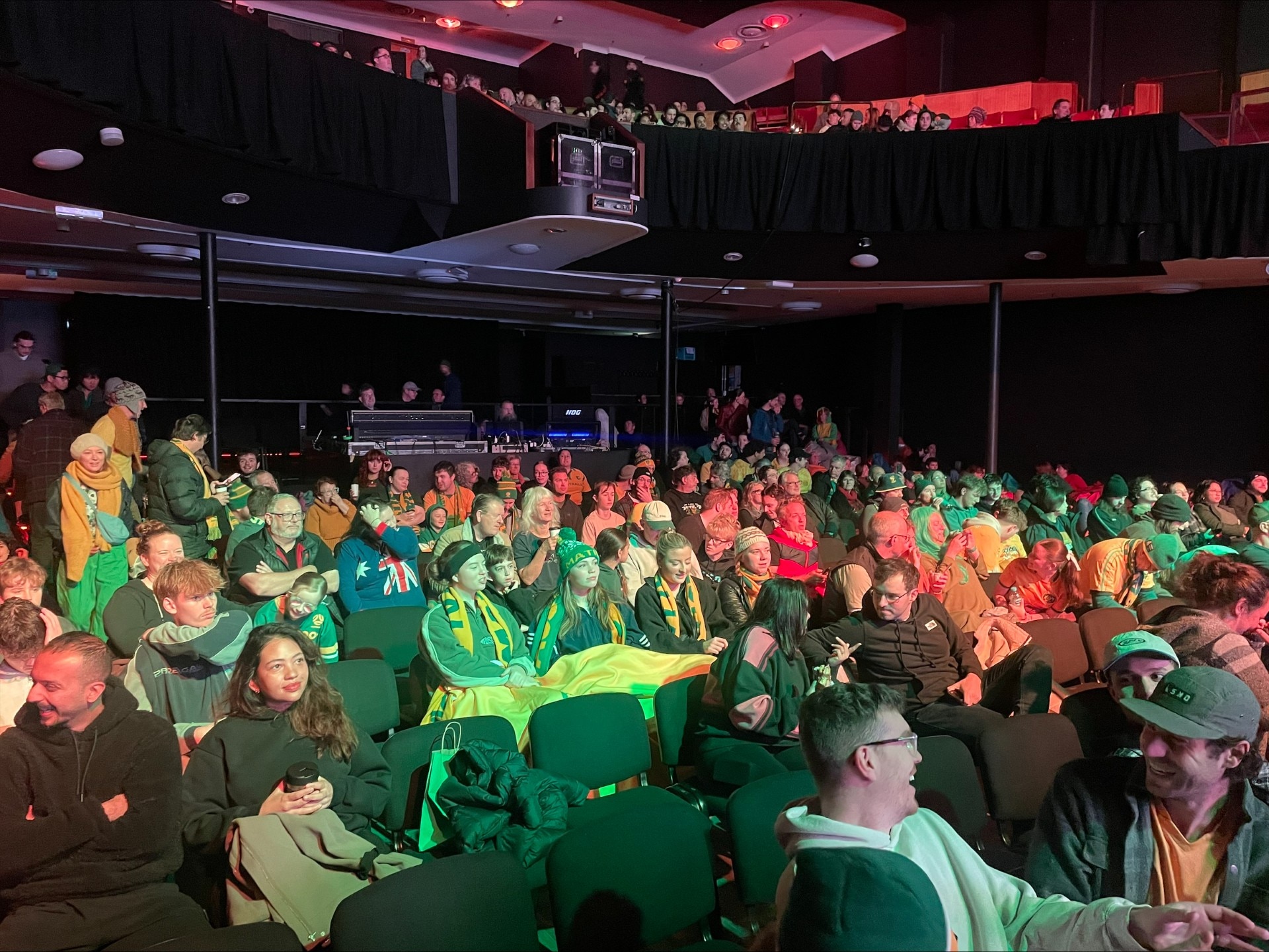 People in a theatre.