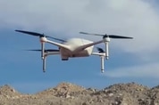 Airobotics autonomous, industrial  drone flies over mine site