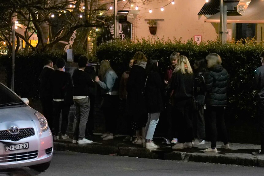 A queue of pub goers outside a venue in Newtown.