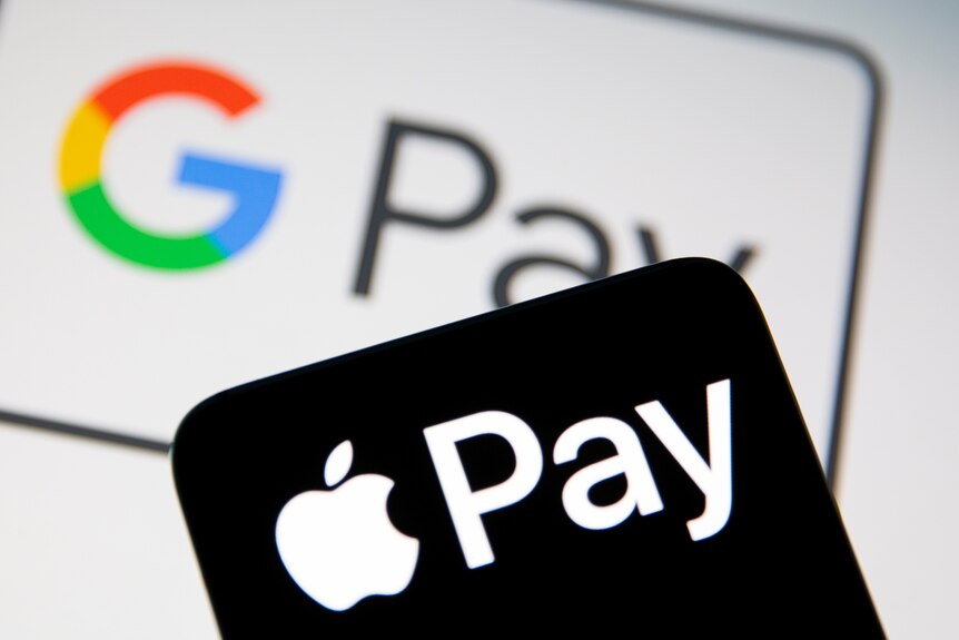 A phone with Apple Pay logo on a displayed Google Pay logo.