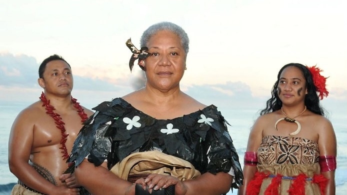 Fiame Naomi Mata'afa is the first woman to be elected PM of Samoa pictured with a woman and man either side in traditional dress
