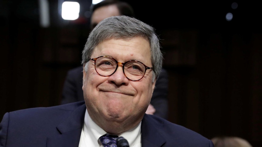 William Barr smiles during a break in his Senate Judiciary Committee hearing.