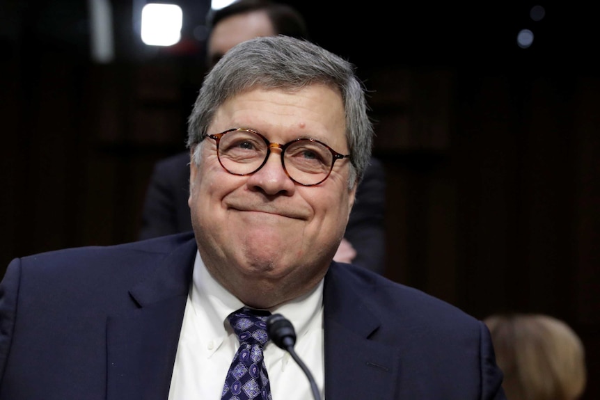 William Barr smiles during a break in his Senate Judiciary Committee hearing.