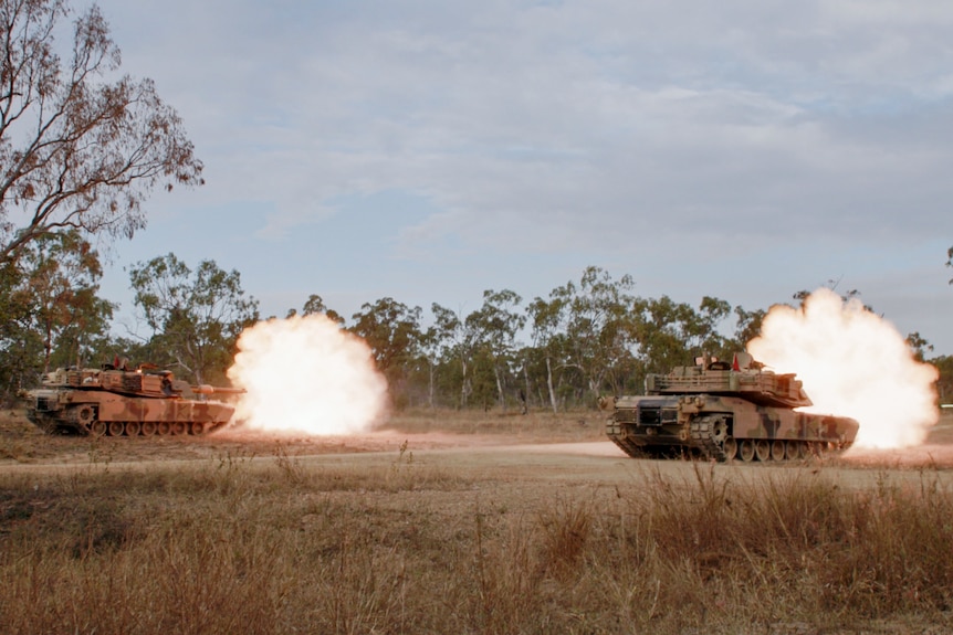 Abrams tank firing.