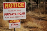 A sign says "Notice. Century Mine. Private road. Authorised access only".