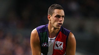 Johnson will miss five games for the Dockers.