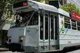 A Melbourne tram makes its way through the CBD