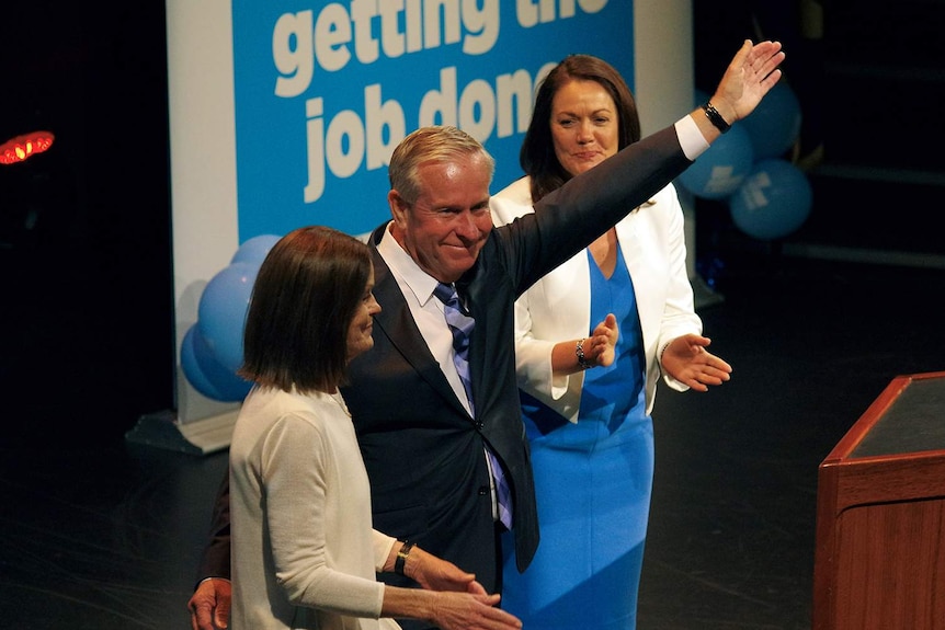 Premier Colin Barnett arrives onstage at the Liberal party election campaign launch with Liza Harvey.