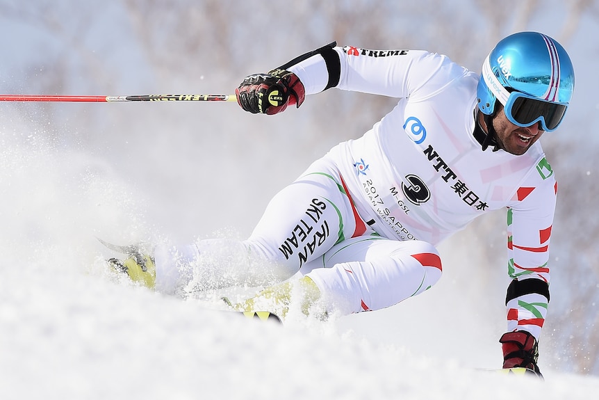 Iranian Hossein Saveh-Shemshaki competes in the men's alpine skiing giant slalom at the 2017 Sapporo Asian Winter Games