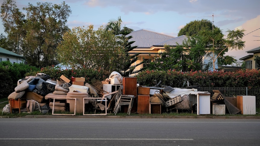 Flood damaged furniture on a street in Mullumbimby.