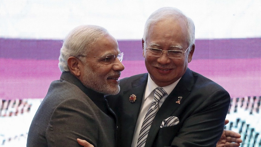 India's prime minister Narendra Modi (left) is greeted by Malaysia's prime minister Najib Razak