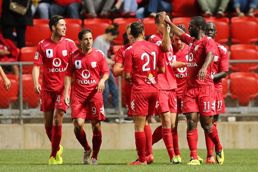 Adelaide United celebrates Bruce Djite goal