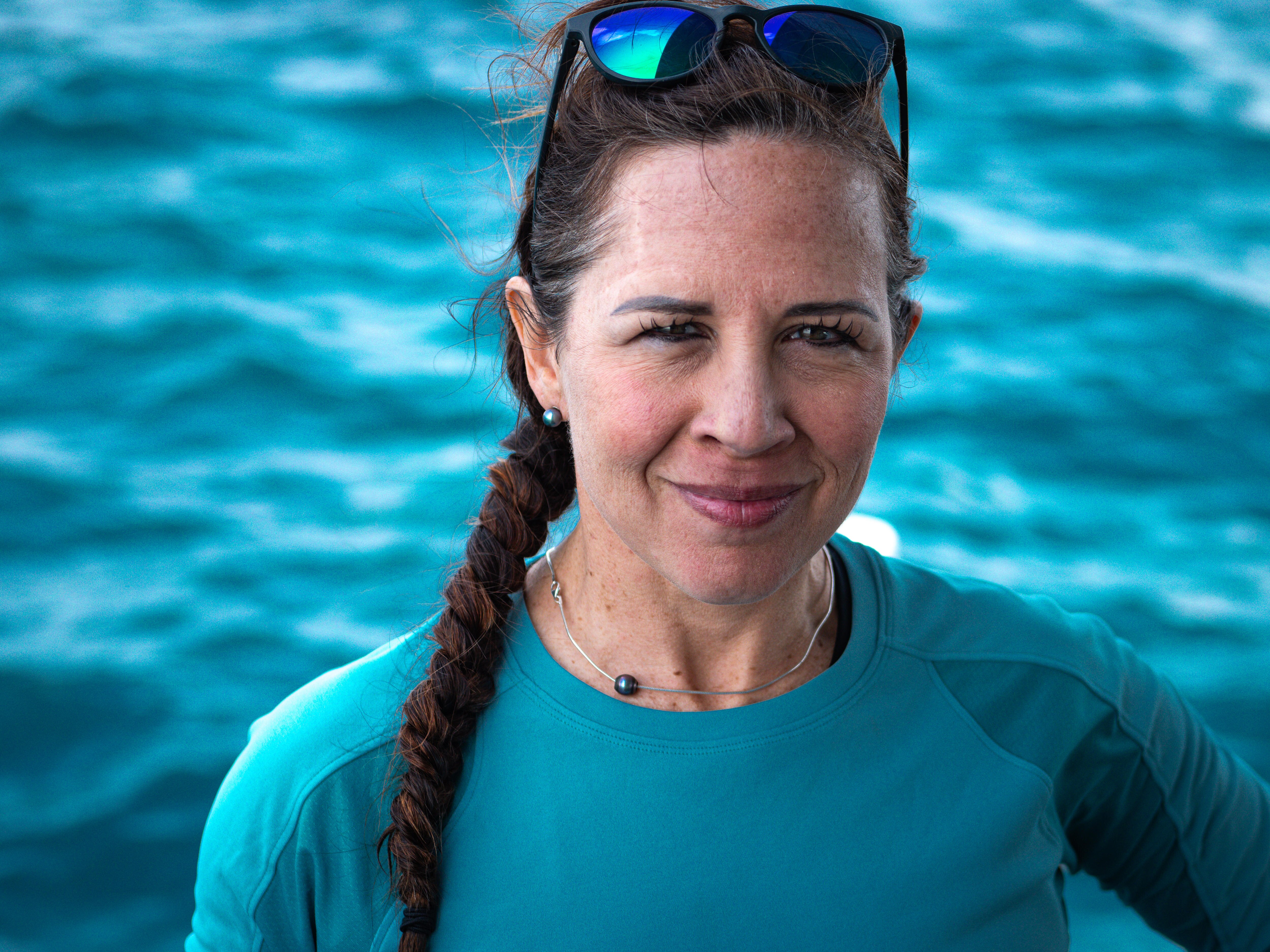 headshot of woman on a boat.
