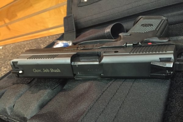 Presidential hopeful Jeb Bush tweeted the image of a gun engraved with his name.